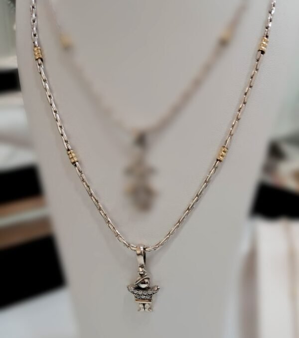 Cadena y dije niño plata y oro