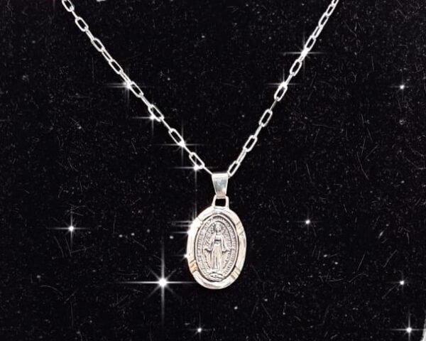 cadena de plata y medalla de plata y oro